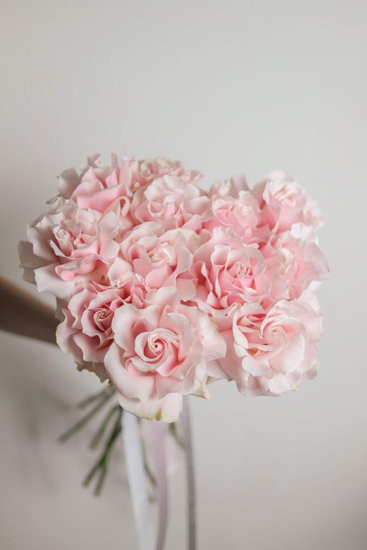 Corporate meeting room with carefully timed floral arrangements that maintain elegance throughout business hours